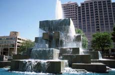 water display with city buildings in background in albuquerque new mexico usa